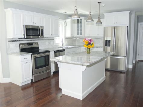 pine cabinets with stainless steel appliances white counter tops|white countertop cabinets colors.